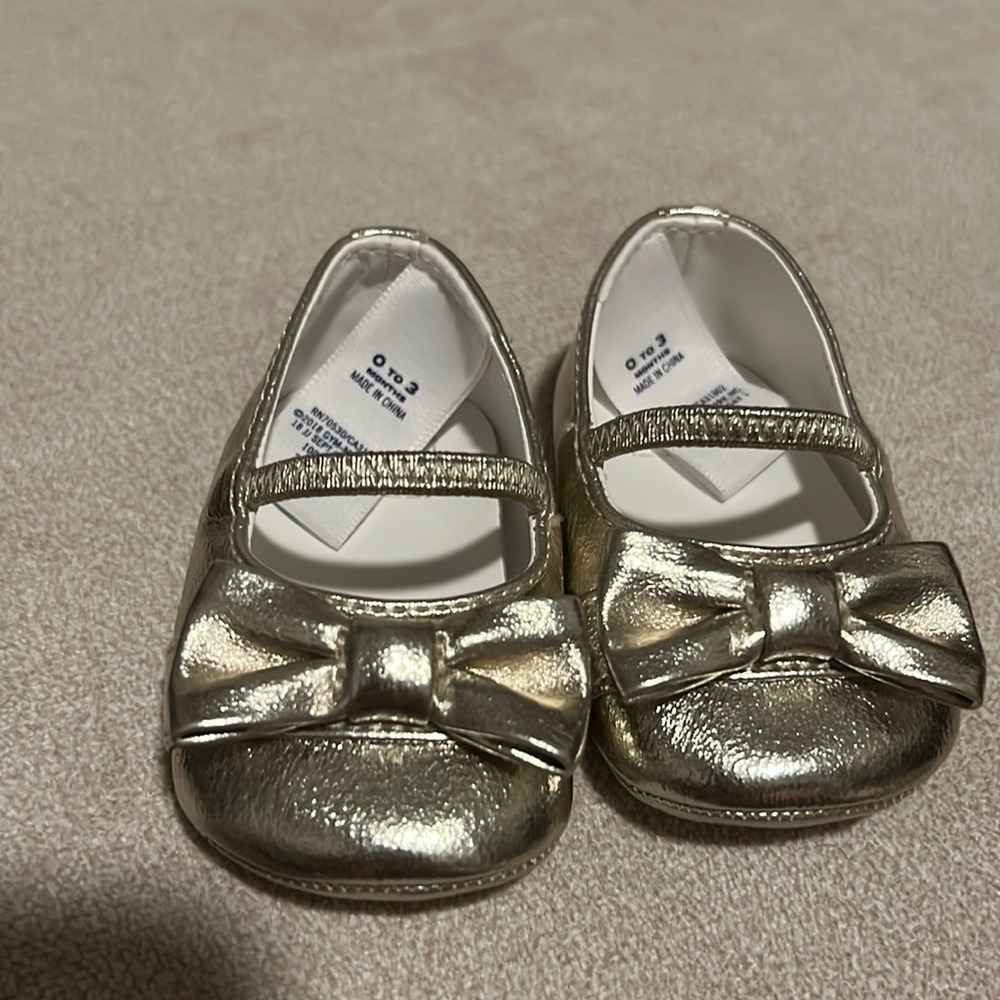 Janie and jack 0-3 months gold shoes.
